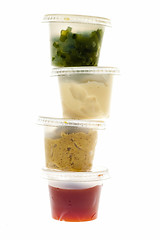 Image showing Stack of condiment containers