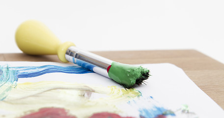 Image showing green paint with brush