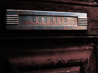 Image showing Old mail slot in old door