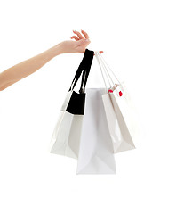 Image showing hand with shopping bags