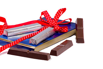 Image showing A plate of chocolate in a beautiful package on a white backgroun
