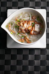 Image showing Thai Noodle Soup with Crispy Pork
