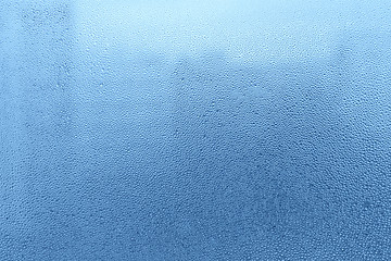 Image showing Natural water drops on glass