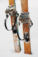 Image showing old wooden skis in the snow
