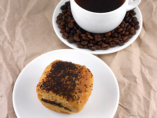 Image showing Coffee and coffee beans on white plate with sweet cake