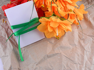 Image showing flowers, christmas balls and white invitation card, christmas decorations