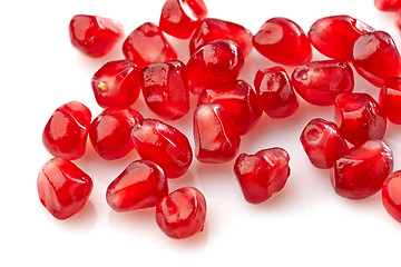 Image showing pomegranate seeds on a white background