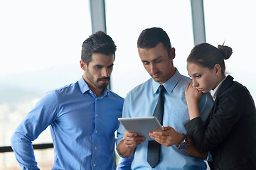 Image showing business man using tablet compuer at office