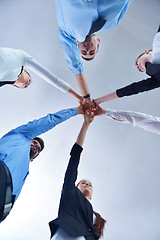 Image showing business people group joining hands