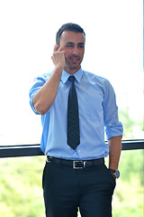 Image showing business man talking by cellphone