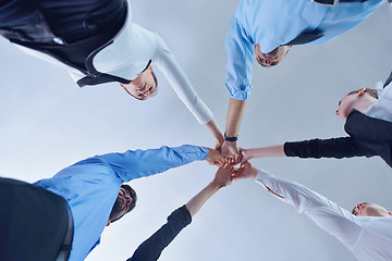 Image showing business people group joining hands