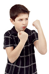 Image showing teen boy boxer trains defence