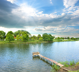 Image showing Fishing pier on the river