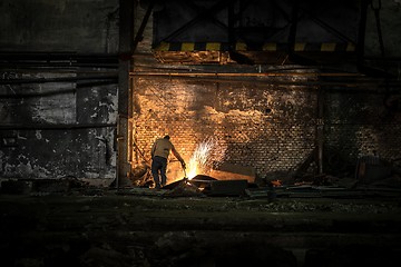 Image showing Welding manwith sparks