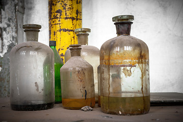 Image showing Old laboratory with a lot of bottles