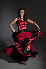 Image showing Young woman dancing flamenco