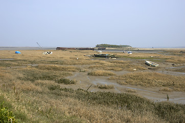 Image showing Boats in the mud