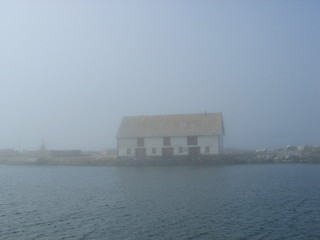 Image showing Old seahouse in fog