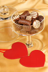 Image showing Chocolate pralines and heart shapes