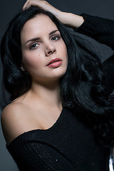 Image showing Dark moody portrait of a brunette beauty