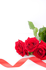 Image showing Bouquet of red roses with ribbon border