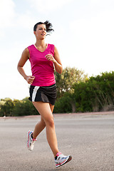 Image showing Caucasian woman practicing jogging in the park