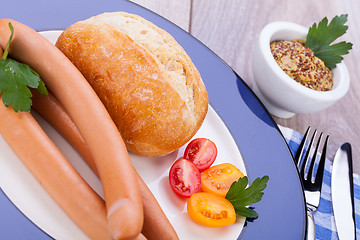 Image showing tasty sausages frankfurter with grain bread 