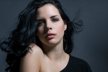 Image showing Dark moody portrait of a brunette beauty