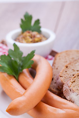 Image showing tasty sausages frankfurter with grain bread 