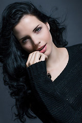 Image showing Dark moody portrait of a brunette beauty