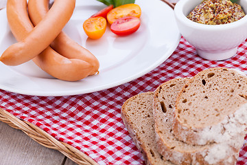 Image showing tasty sausages frankfurter with grain bread 