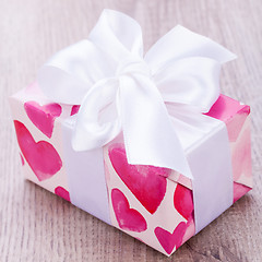 Image showing Pretty Valentines gift with hearts on the giftwrap