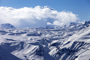 Image showing Snowy plateau and blue sky with clouds at nice evening