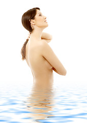 Image showing topless brunette in water looking up #2