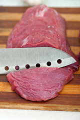 Image showing raw beef cutting