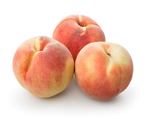 Image showing Three beautiful peaches