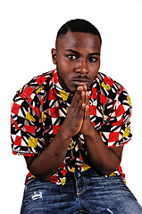 Image showing Black man praying.