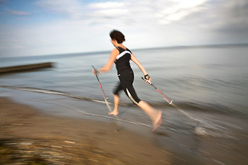 Image showing Nordic walk at the beach