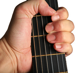 Image showing Holding a guitar