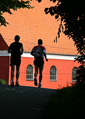 Image showing People jogging in a city