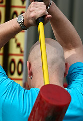 Image showing Bold man with hammer