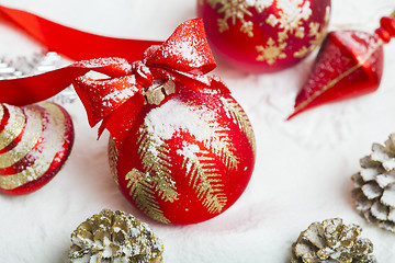 Image showing Christmas ball with red bow and ribbon