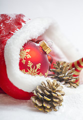 Image showing Christmas ball with red bow and ribbon