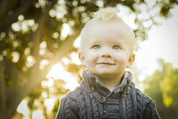 Image showing Adorable Blonde Baby Boy Outdoors at the Park
