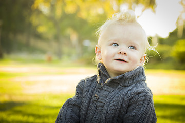 Image showing Adorable Blonde Baby Boy Outdoors at the Park
