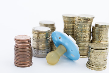 Image showing pacifier with hard money