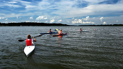 Image showing Young people on kayak in denmark on a lake