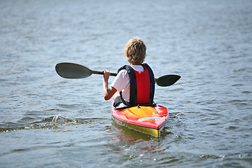 Image showing Young people on kayak in denmark on a lake