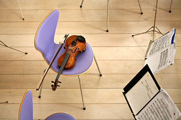 Image showing Violin on a chair