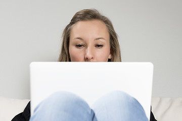 Image showing woman on sofa with laptop